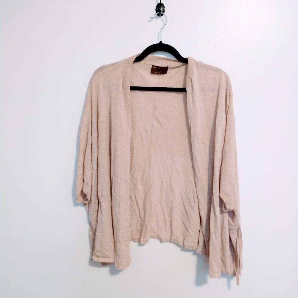 Kerisma cream kimono shrug cardigan with ties at the batwing sleeve.  Size m/l.